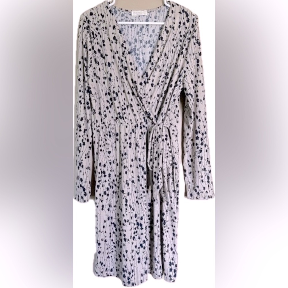 Perfect Peach long sleeve wrap style dress. Excellent condition. Women’s Size XL